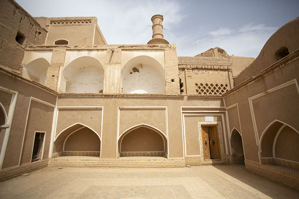 Picture of Shaking minaret towering above a courtyard of the mosque of Kharanaq - Iran - Asia