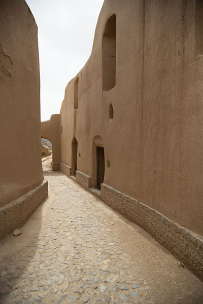 Cobblestones and renovated walls in the old part of Kharanaq | Kharanaq | Iran