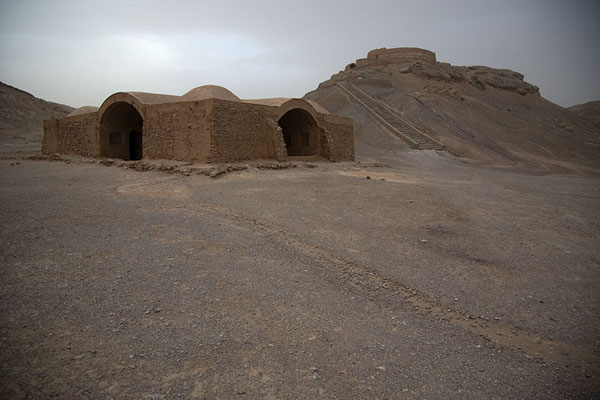 One of the buildings with the lower Tower of Silence in the background | Yazd Towers of Silence | Iran