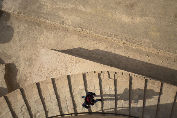 Picture of Someone walking the stairs of the Minaret of Malwiyah, of the Great Mosque of Samarra