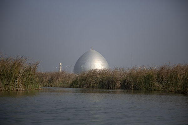 Metal-coloured dome rising above the reeds of the Mesopotamian Marshes | Mesopotamian Marshes | Iraq