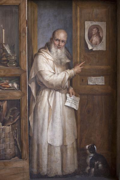 Picture of Baths of Diocletian (Italy): Scene of old man and cat in door opening in a trompe l'oeuil painting at the cloister of Michelangelo