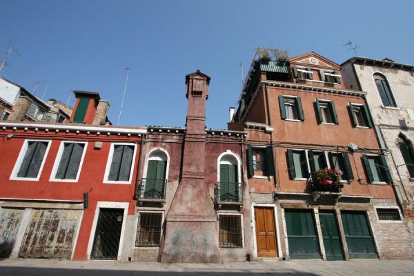Picture of Castello (Italy): House with chimney in a quiet street of Castello
