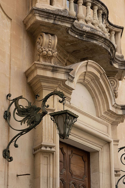 Lantern hanging from a wall on a building in Lecce | Lecce | Italia