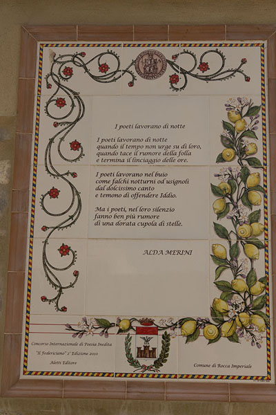 One of the poems on the wall depicting the lemons for which Rocca Imperiale is famous | Rocca Imperiale | Italy