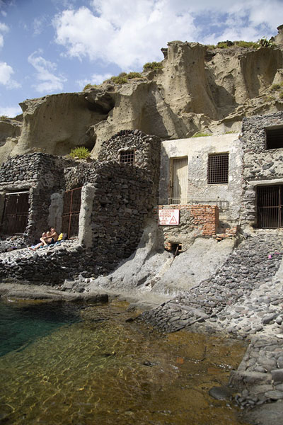 Picture of Salina (Italy): Beach and rocky coastline with storage rooms at Pollara