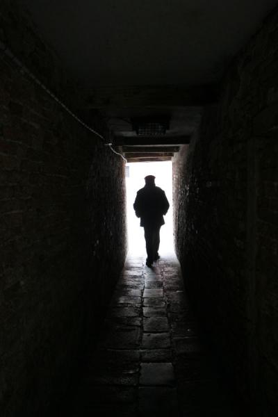 Picture of San Polo (Italy): Walking through a tunnel in San Polo
