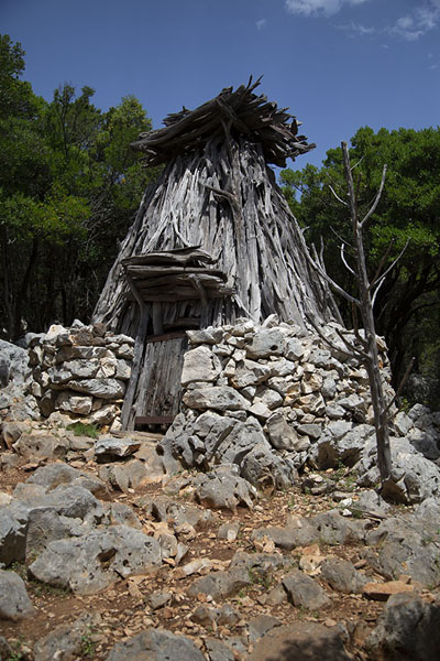 Traditional hut made of local materials in the mountains on the east coast of Sardinia | Selvaggio Blu | Italy