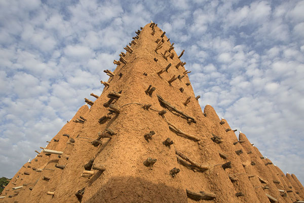 Looking up the northwestern corner of the mosque of Kong | Kong mosque | Ivory Coast