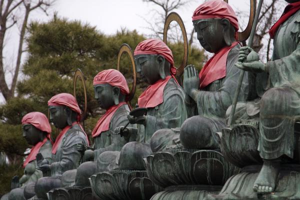 Row of six Bodhisattvas, or Rokujizo, in the garden in front of Zenko-ji Temple | Zenko-ji Temple | Japan