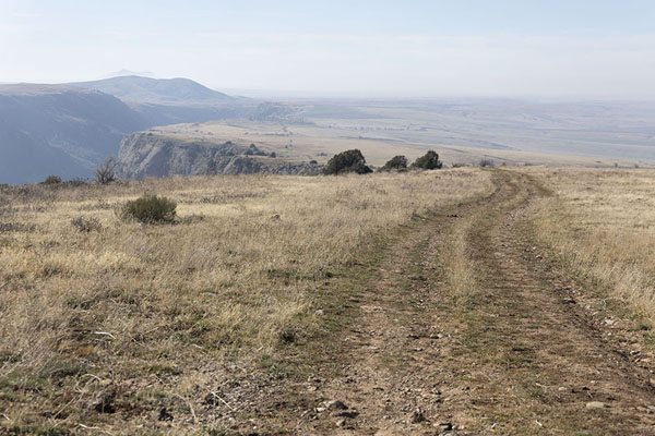 Picture of Aksu Canyon (Kazakhstan): Dirt track running next to Aksu Canyon, looking west