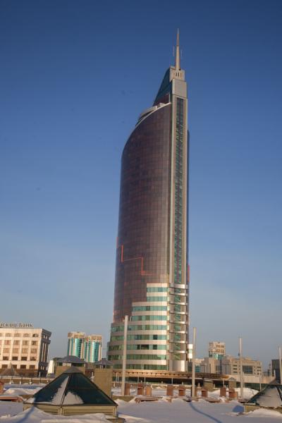 Picture of Astana modern architecture (Kazakhstan): The tall skyscraper housing the Ministry of Transport and Communication, nicknamed Lighter or Swordfish