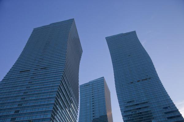 Picture of Astana modern architecture (Kazakhstan): Looking up the three wavy towers, nicknamed the Northern Lights
