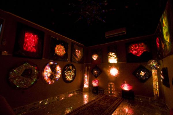 Picture of House of Mirrors (Kuwait): Works of art coming to life in the dark in a room in the House of Mirrors