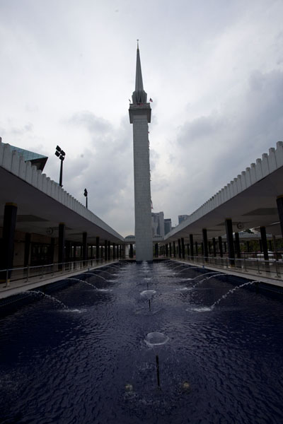 Fountains and the modern minaret of the National Mosque | Masjid Negara | Malaysia