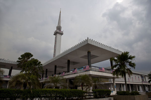 Looking up the modern Masjid Negara with pointy minaret | Masjid Negara | Malaysia