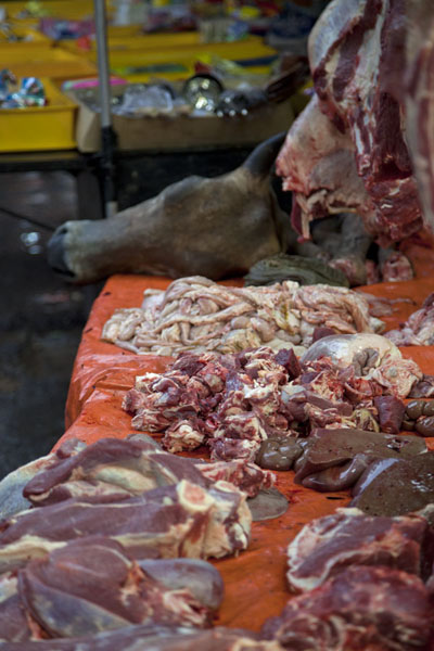 Picture of Meat, intestines, and the head: all the parts of the cow are present on this cow-stall