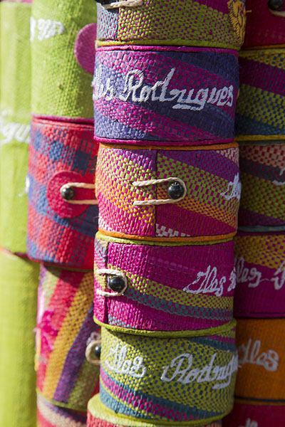 Foto van Handmade colourful Rodrigues souvenirs for sale at the market of Port MathurinPort Mathurin - Mauritius
