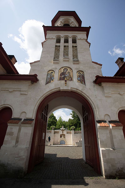 Picture of Curchi monastery (Moldova): Entrance gate of Curchi monastery with fountain in the background