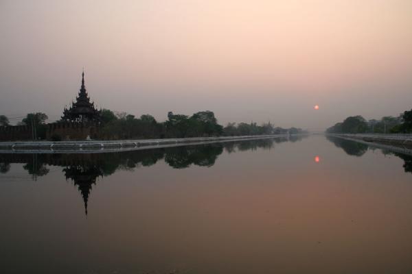 Picture of Mandalay (Myanmar): Sunrise over the moat of the Royal Palace of Mandalay
