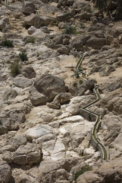 Foto van Falaj transporting water through Wadi Shab - Oman - Azië