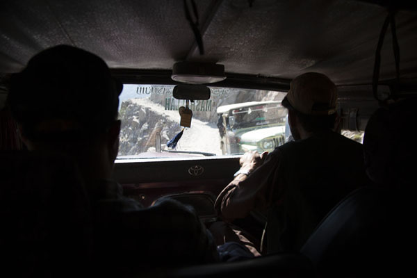Picture of View from inside a jeep, with oncoming traffic