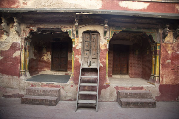 Picture of Wazir Khan mosque (Pakistan): Shops and staircase at the Calligrapher's Bazaar, in an alley next to the entrance to Wazir Khan  mosque