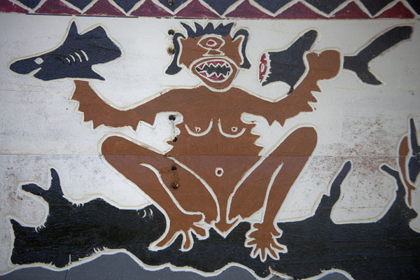 Picture of One-eyed monster tearing a shark apart, as depicted on the bai of Melekeok