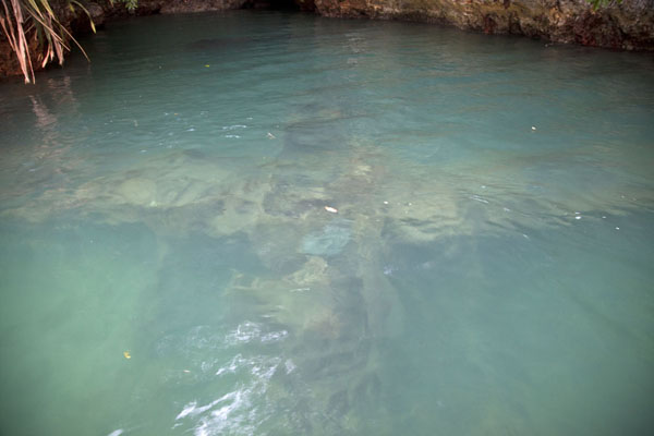 Picture of Metuker Ra Bisech stone money quarry (Palau): Contours of a Japanese fighter plane on the bottom of the sea near the stone money quarry
