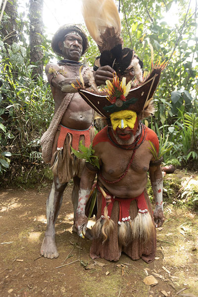 Huli Wigmen getting their decorations done | Huli Wigmen | Papua New Guinea