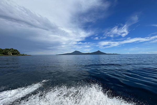 View of Lolobau Island from the banana boat | Kimbe Kavieng Overland | Papua Nuova Guinea
