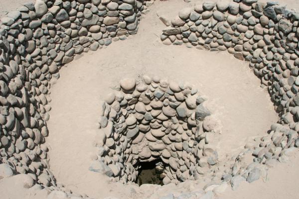 Looking into one of the shell-shaped aqueduct access at Cantalloc | Cantalloc Aqueducts | Peru