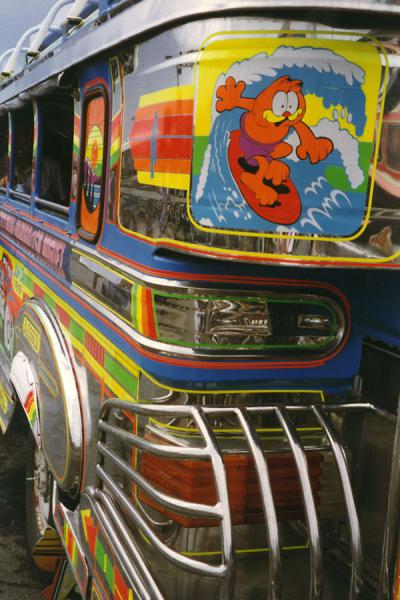 Foto van Close-up of jeepney in the Philippines with a surfing Garfield - Filippijnen - Azië