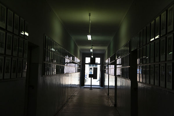 Picture of Corridor in one of the barracks of Auschwitz with pictures of victims of the Nazi extermination programmeAuschwitz-Birkenau - Poland
