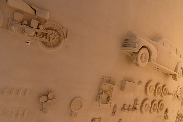 Wall in the museum with vehicles attached | National Museum Qatar | Qatar