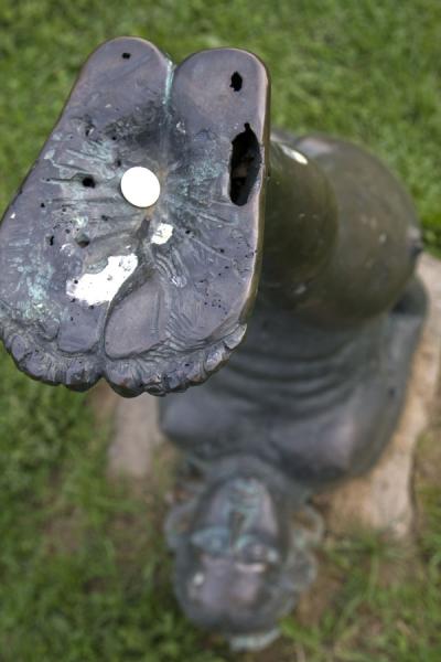 Picture of Sculpture Park (Russia): Upside-down: girl putting her feet up, with one ruble on the sole of her foot