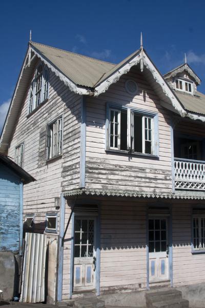 Foto di Big blue and white wooden house in Soufrière - Santa Lucia - America