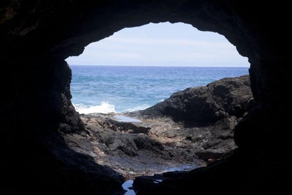 Looking through a natural hole in the lava rock of To Sua | To Sua trench | Samoa