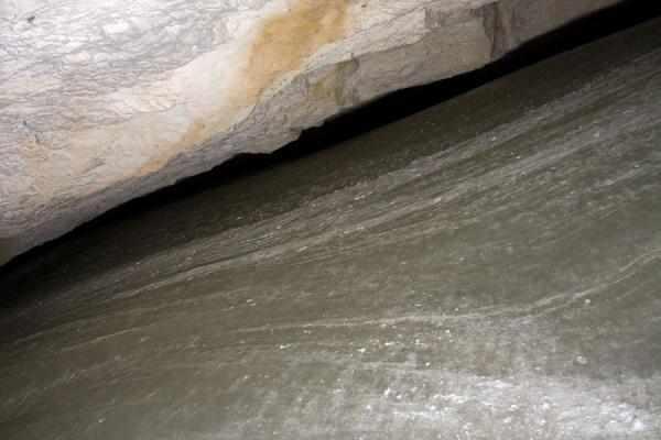 Curves in the ice floor under the rocks | Dobšinska Ice Cave | Slovakia
