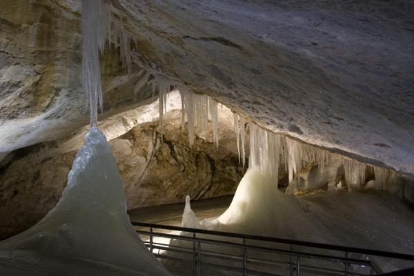 Trail leading through the ice formations in one of the open spaces of Dobšinska Ice Cave | Dobšinska Ice Cave | Slovakia