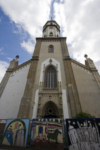 Picture of Levoča Old Town (Slovakia): Looking up at the Gothic church of St. James of Levoča with graffiti in front
