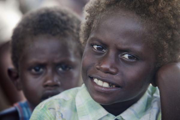 Picture of Young boy wtih worried look at the market of Gizo - Solomon Islands - Oceania