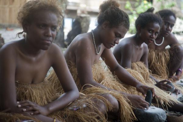 Woman in Langa Langa lagoon making shell-money | Solomon Island people | Solomon Islands