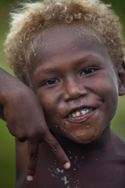 Picture of Solomon Island people (Solomon Islands): Young kid posing for a photo on Malaita island