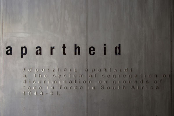 Foto di The definition of apartheid explained at the entrance to the museumJohannesburg - Africa del Sud