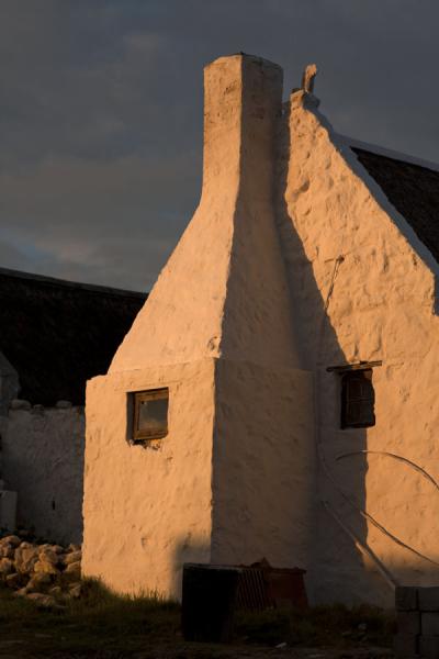 Picture of Arniston (South Africa): Traditional house with exterior chimney at Arniston in the afternoon