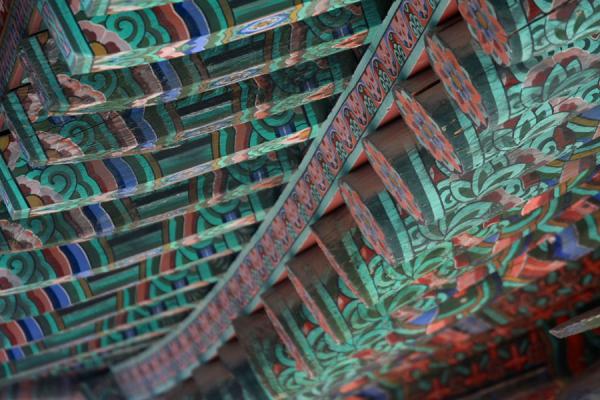 Picture of Colourful decorationn of inside of the roof of a temple at Bulguksa