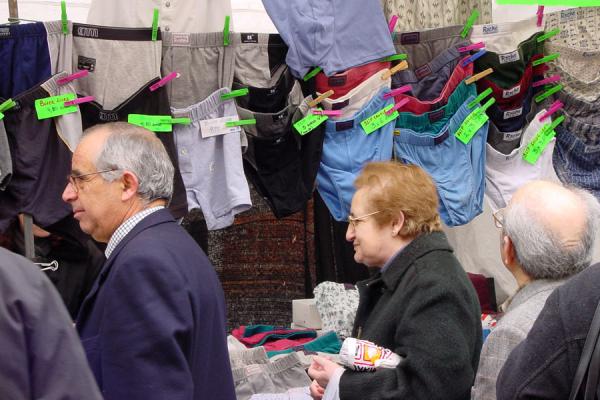 Buying open-air underwear | Rastro flea market | Spain