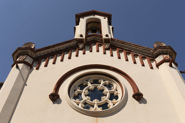 Looking up the facade of the chapel inside the Plana Novella complex | Sakya Tashi Ling monastery | Spain