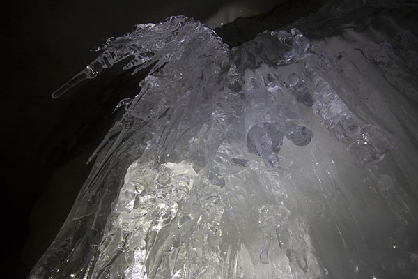 Close-up of ice formations hanging from the ceiling of the ice cave | Sarkofagen and ice cave hike | Svalbard and Jan Mayen